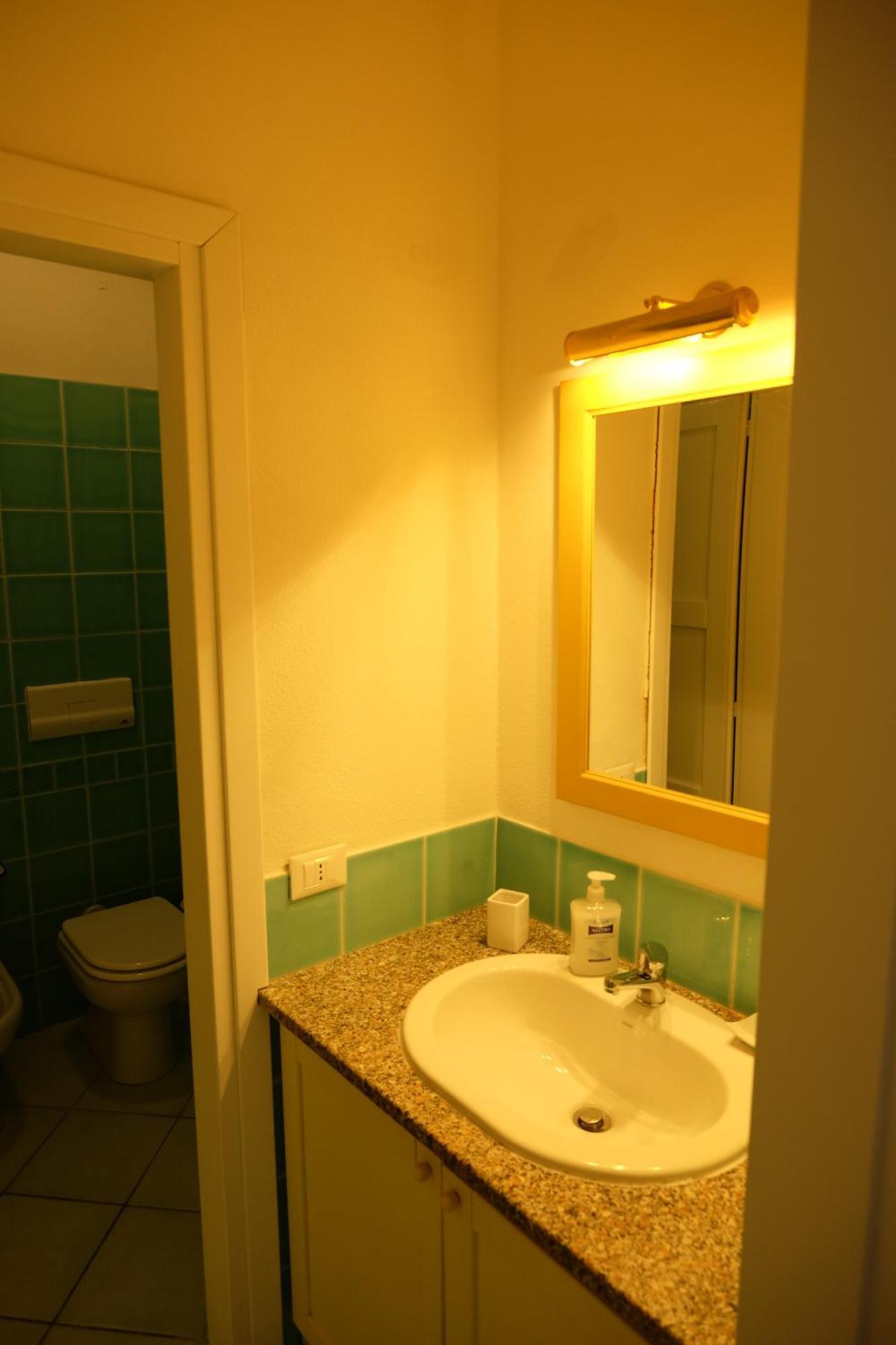Calarossa Sardinia Apartments อิโซลา โรสซา ภายนอก รูปภาพ